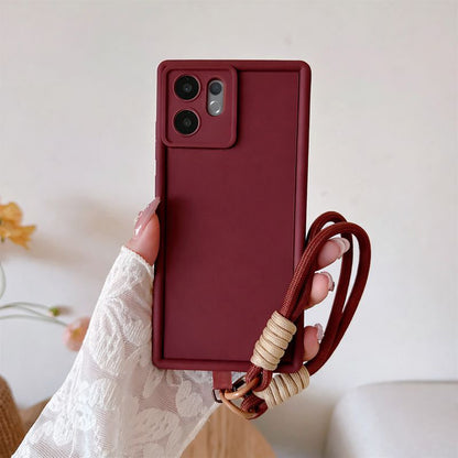 Vivo V60 5G Maroon phone case with a strap held by a hand against a light background