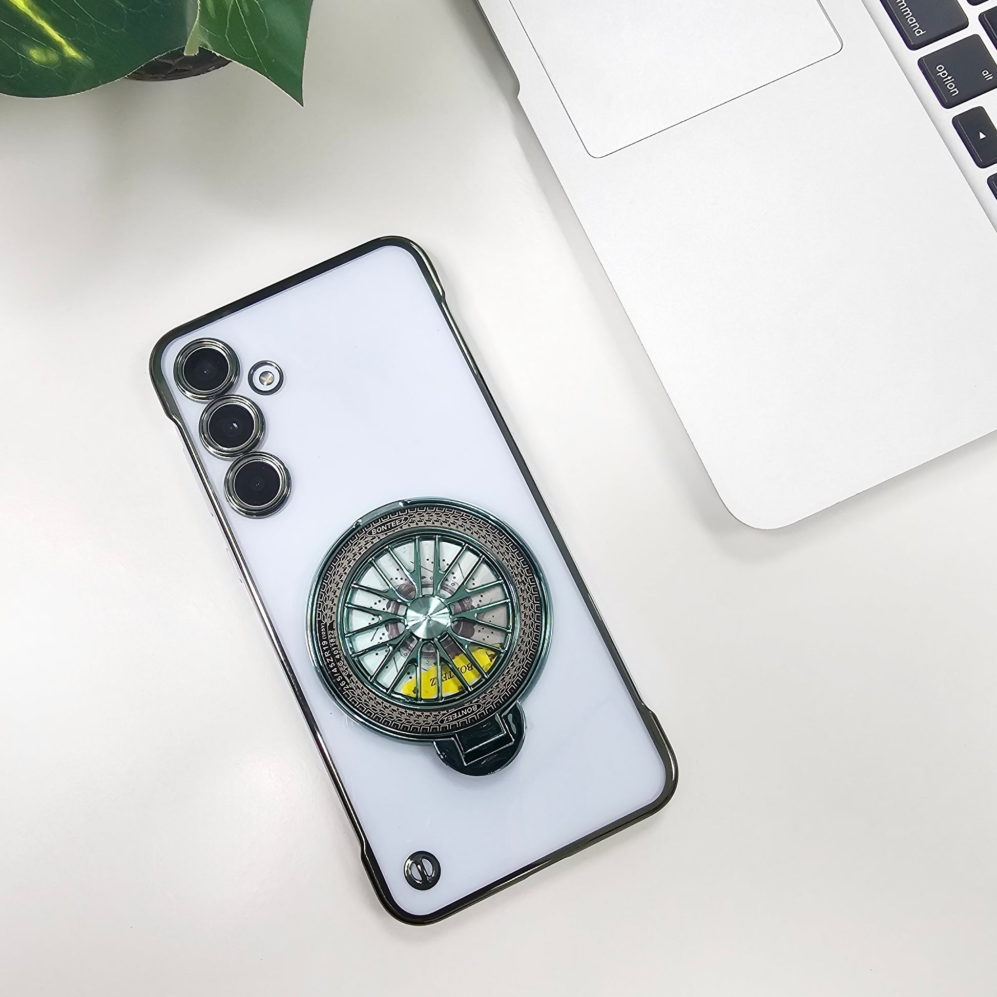 Phone case with a decorative wheel design on a white surface