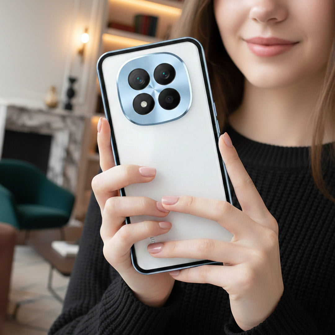 Person holding a smartphone with a modern camera design in an indoor setting
