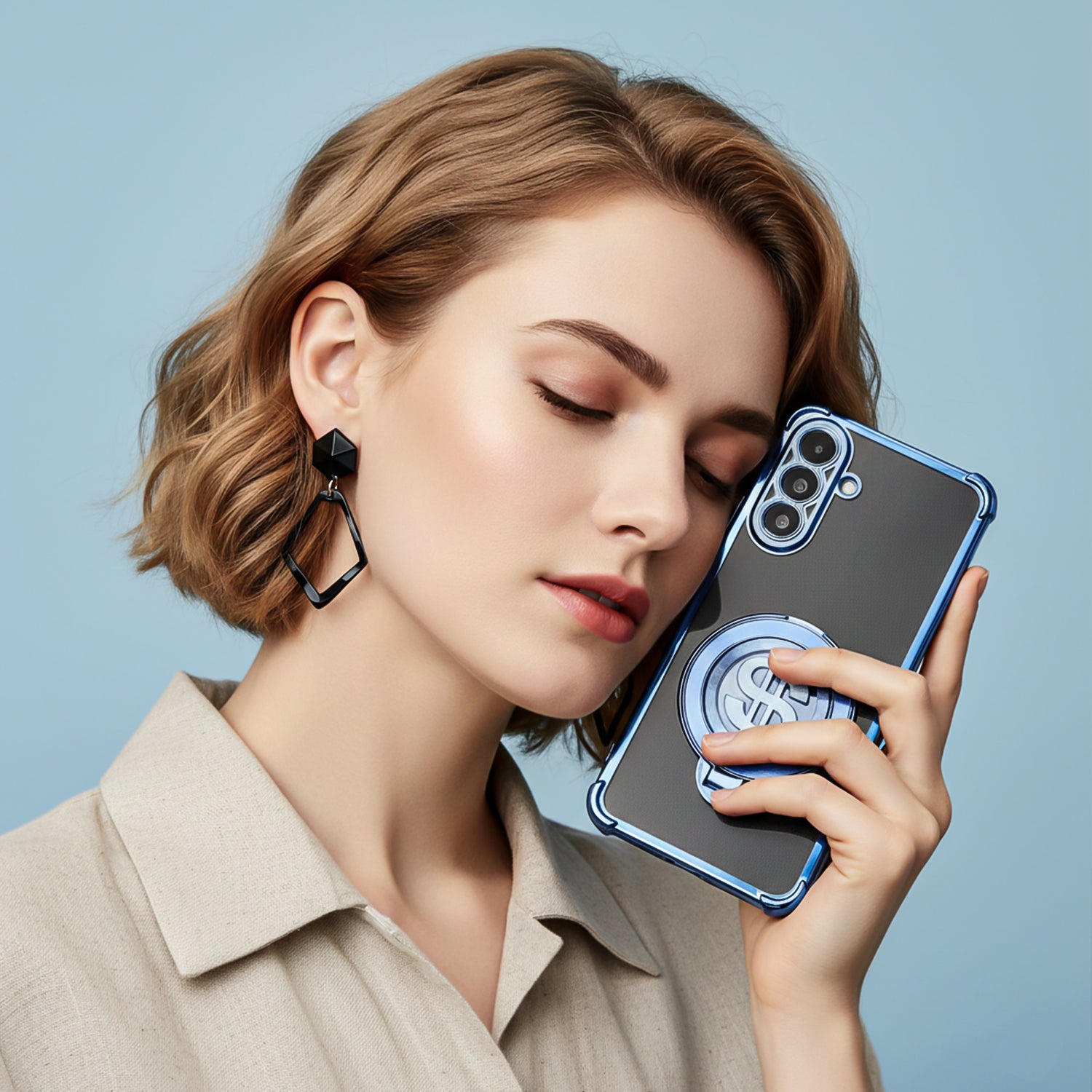 Woman holding a Samsung Galaxy A56 5G phone with a case against a light blue background