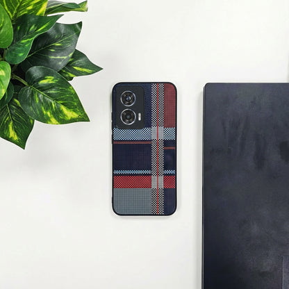 Motorola Edge 50 Fusion 5G Phone case with plaid pattern on a white surface next to a plant and black object