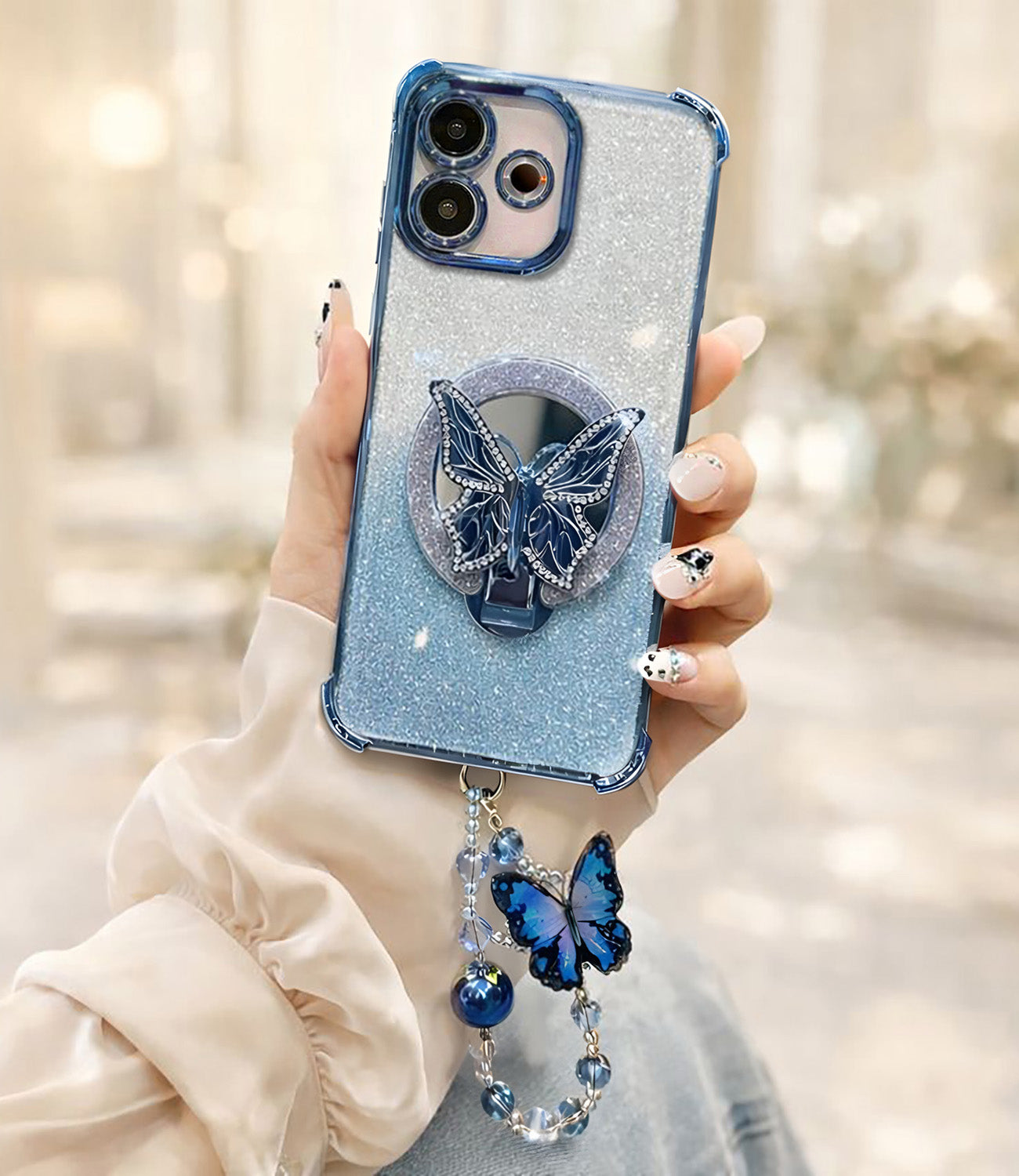 Oppo A5 Pro 5G Phone case with butterfly design held by a hand against a blurred background