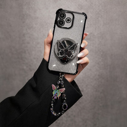 Hand holding a phone case with butterfly design and charm on a gray background