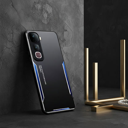 Black smartphone case with blue accents on a dark surface with decorative elements