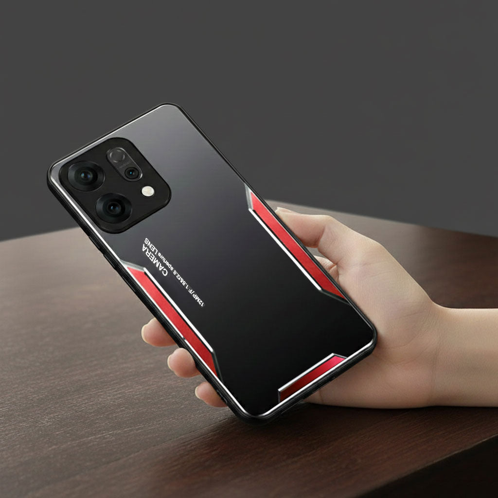 Hand holding a smartphone with a black and red case on a wooden surface