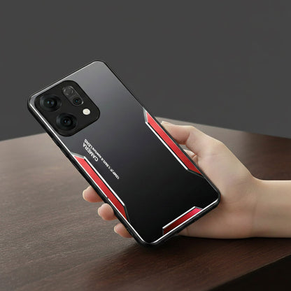 Hand holding a smartphone with a black and red case on a wooden surface