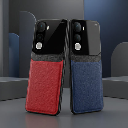 Two phone cases, one red and one blue, on a reflective surface with a blurred background.