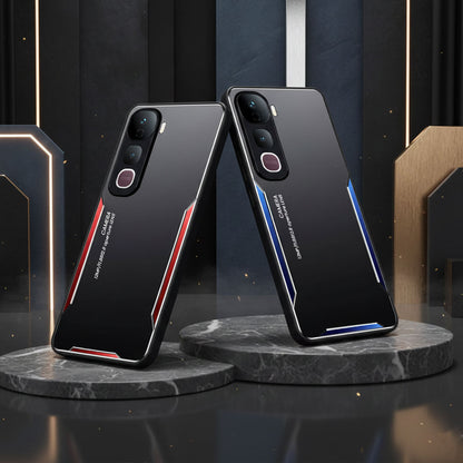 Two black smartphone cases with red and blue accents on gray stands against a dark background